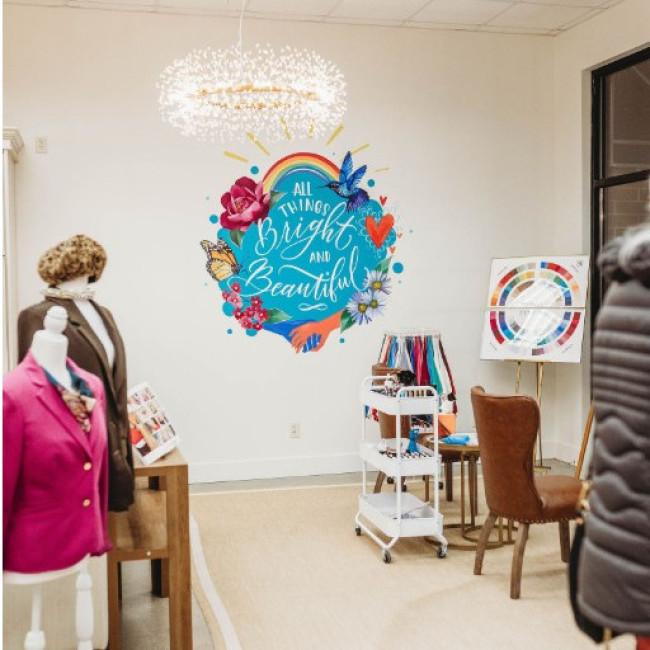 Welcome! We have chairs & mirrors lined up against our gorgeous windows for natural light. We also have space so family & friends can get a front row view!  